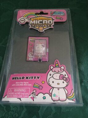 Smallest Hello Kitty micro pop figure new in packaging, unicorn